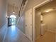 Hallway view of laundry room with washer and dryer at 4193 Limerick Dr, Lake Wales, FL 33859