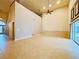 Spacious living room with high ceilings, ceiling fan, and tile floors at 4193 Limerick Dr, Lake Wales, FL 33859
