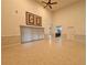 High ceiling living room with tile floors, and access to backyard at 4193 Limerick Dr, Lake Wales, FL 33859