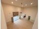 High ceiling living room with tile floors, access to backyard at 4193 Limerick Dr, Lake Wales, FL 33859