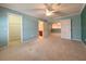 Main bedroom with carpet, walk-in closet and attached bath at 4193 Limerick Dr, Lake Wales, FL 33859