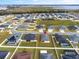 House location shown in an aerial view of a residential area at 425 Riders Loop, Auburndale, FL 33823