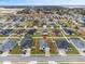 Bird's-eye view of a house and surrounding neighborhood at 425 Riders Loop, Auburndale, FL 33823