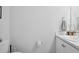 Simple bathroom with single sink and toilet at 425 Riders Loop, Auburndale, FL 33823