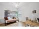 Bright bedroom with built-in desk and daybed at 425 Riders Loop, Auburndale, FL 33823