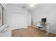 Bedroom with home office and built-in closet at 425 Riders Loop, Auburndale, FL 33823