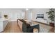 Living area showcasing a comfortable sectional sofa and mounted TV at 425 Riders Loop, Auburndale, FL 33823