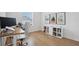 Home office with standing desk and built-in shelving at 425 Riders Loop, Auburndale, FL 33823