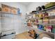 Well-organized pantry with ample shelving for food storage at 425 Riders Loop, Auburndale, FL 33823