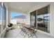 Spacious screened patio with sliding doors and backyard view at 425 Riders Loop, Auburndale, FL 33823