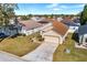 Single-Gathering home with driveway and landscaped yard at 426 Allison Ave, Davenport, FL 33897
