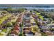Aerial view of lakefront community with many houses at 426 Allison Ave, Davenport, FL 33897