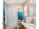 Clean bathroom with shower/tub combo, toilet and vanity at 426 Allison Ave, Davenport, FL 33897