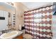 Simple bathroom with shower and updated vanity at 426 Allison Ave, Davenport, FL 33897