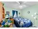 Cozy bedroom with a comfortable bed and plenty of natural light at 426 Allison Ave, Davenport, FL 33897