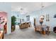Bright dining area with a table for four and view into living room at 426 Allison Ave, Davenport, FL 33897
