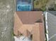 Home's brown roof and pool with screened enclosure at 437 Grand Reserve Dr, Davenport, FL 33837