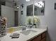 Bathroom with single vanity and decorative accents at 437 Grand Reserve Dr, Davenport, FL 33837