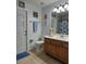 Full bathroom with toilet, vanity, and shower/tub combo at 437 Grand Reserve Dr, Davenport, FL 33837