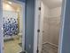 Bathroom with shower and separate closet at 437 Grand Reserve Dr, Davenport, FL 33837