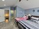 Bedroom with two beds, one with a Disney theme at 437 Grand Reserve Dr, Davenport, FL 33837