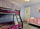 Charming bedroom with a bunk bed and Frozen mural at 437 Grand Reserve Dr, Davenport, FL 33837