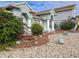 Two-story house with lush landscaping and a light-grey exterior at 437 Grand Reserve Dr, Davenport, FL 33837