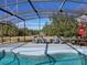 Enjoy the view from this relaxing pool area at 437 Grand Reserve Dr, Davenport, FL 33837