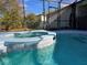 Enjoy this relaxing spa adjacent to the pool at 437 Grand Reserve Dr, Davenport, FL 33837