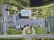 Clubhouse with pool, parking, and manicured grounds at 4505 Back Nine Dr, Winter Haven, FL 33884