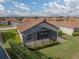Property with screened lanai and surrounding homes at 4505 Back Nine Dr, Winter Haven, FL 33884