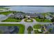 Resort-style clubhouse with lake views, pool, and lush landscaping at 4505 Back Nine Dr, Winter Haven, FL 33884