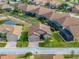 One story house with two-car garage, situated in a neighborhood near a pond at 4505 Back Nine Dr, Winter Haven, FL 33884