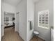 Small bathroom with access to bedroom and another bathroom at 4505 Back Nine Dr, Winter Haven, FL 33884