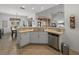 Kitchen features a large island with double sink and stainless steel appliances at 4505 Back Nine Dr, Winter Haven, FL 33884