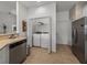 Laundry room with washer, dryer, and shelving at 4505 Back Nine Dr, Winter Haven, FL 33884