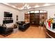 Elegant clubhouse lobby with comfortable seating and fireplace at 4505 Back Nine Dr, Winter Haven, FL 33884