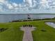 Lakeside memorial with American and POW flags at 4505 Back Nine Dr, Winter Haven, FL 33884