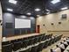 Community theater with many seats and a large screen at 4505 Back Nine Dr, Winter Haven, FL 33884