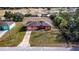 Aerial view of fire damaged house needing major repairs at 517 Cipres Cir, Winter Haven, FL 33880