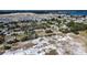 Aerial view of a suburban neighborhood and surrounding landscape at 517 Cipres Cir, Winter Haven, FL 33880