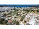 Aerial view of a house with a lake in the background at 517 Cipres Cir, Winter Haven, FL 33880