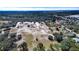 Aerial view of a house in a residential neighborhood at 517 Cipres Cir, Winter Haven, FL 33880
