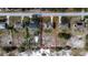 House with fire damage, viewed from above in a residential area at 517 Cipres Cir, Winter Haven, FL 33880