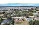 Wide aerial view of neighborhood, highlighting fire damaged property at 517 Cipres Cir, Winter Haven, FL 33880