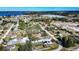 Aerial view of fire damaged house and surrounding houses at 517 Cipres Cir, Winter Haven, FL 33880