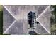 Aerial view of a damaged roof with significant fire damage at 517 Cipres Cir, Winter Haven, FL 33880