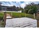 Wooden dock and backyard view at 524 Arneson Ave, Auburndale, FL 33823