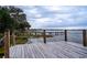 Wooden dock with lake view at 524 Arneson Ave, Auburndale, FL 33823