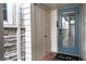 Inviting entryway with a blue door and storage closet at 524 Arneson Ave, Auburndale, FL 33823
